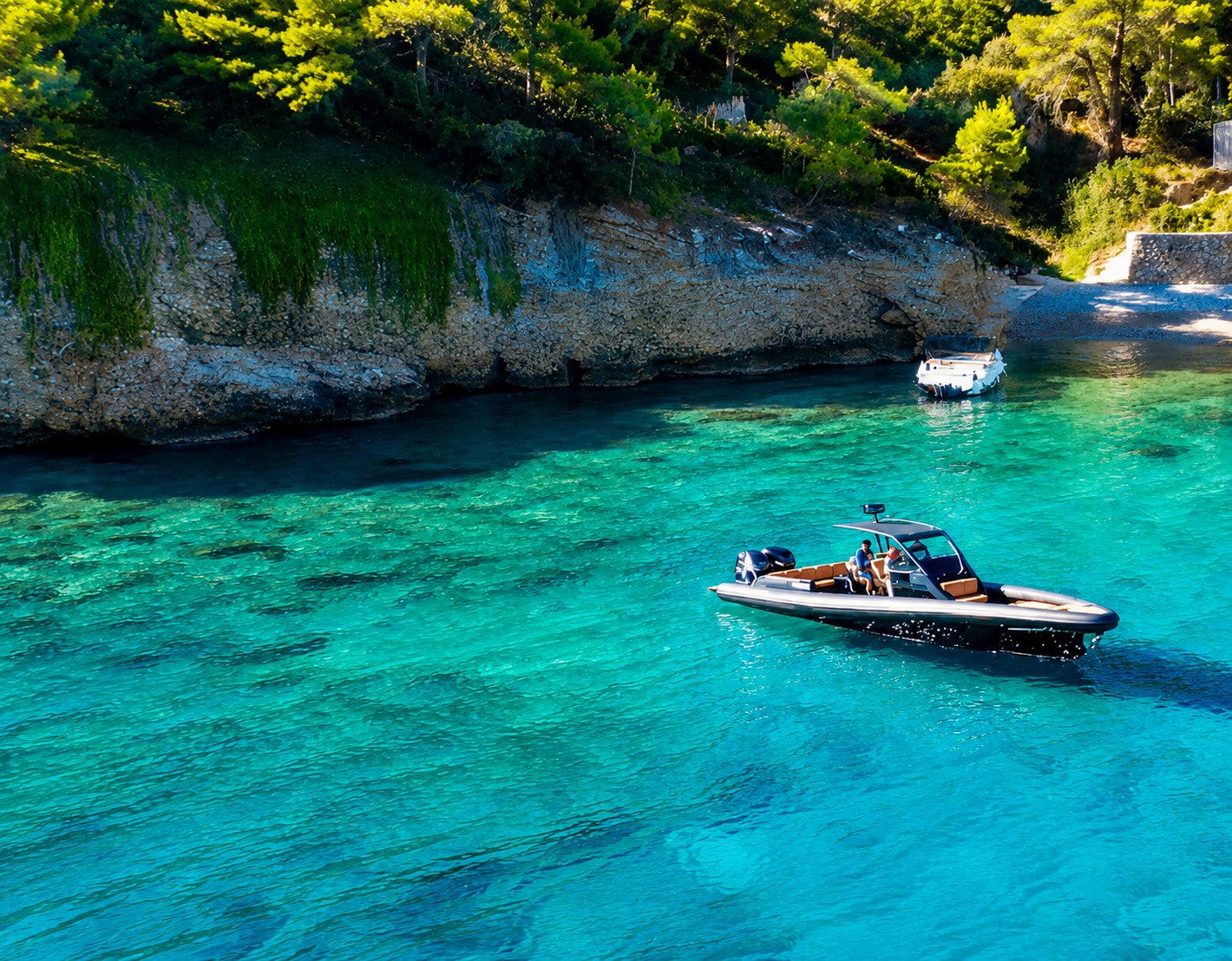 Boat4all luxury RIB cruising along a scenic Greek coastline